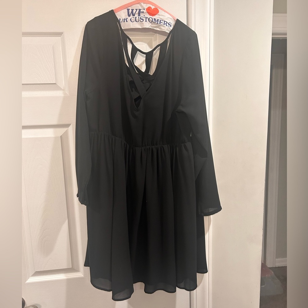 Torrid mid solid black dress with criss cross design on the back, size 2x